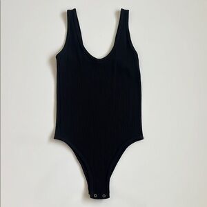Sleek Black Bodysuit with High-Cut Design
